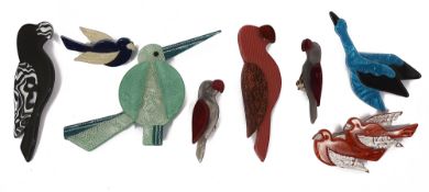 A collection of acrylic Lea Stein bird brooches and earrings
