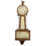 An American New Haven Clock Co. walnut banjo wall clock