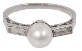 A pearl and diamond-set ring