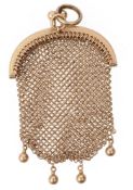 An early 20th century yellow gold mesh coin purse