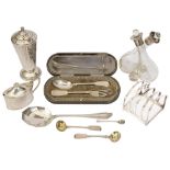 A mixed lot of silver to include an Art Deco sugar caster