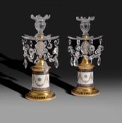 A pair of George III cut glass gilt brass mounted candlesticks, c.1800