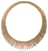 An attractive Continental .750 Egyptian style articulated fringe necklace