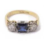 A 1930s 18ct gold three stone sapphire and diamond ring