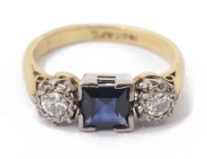 A 1930s 18ct gold three stone sapphire and diamond ring