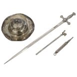 An Edwardian small silver inkwell, a swizzle stick and other items