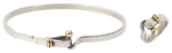 A Tiffany & Co. Sterling silver and 18ct gold mounted hook and eye bangle and ring set,