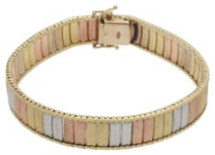 A Continental three coloured gold panel bracelet