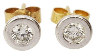 A pair of diamond and 18ct carat gold ear studs