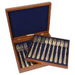 A set of twelve Victorian silver bead pattern fish forks