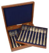 A set of twelve Victorian silver bead pattern fish forks