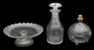 An early 19th c. cut glass tazza, a Prussian shaped decanter and stopper and a Vict. fly trap