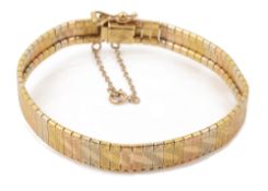 A Continental three coloured gold bracelet