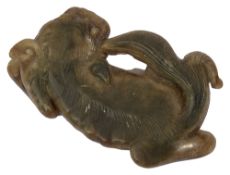 A Chinese jade carving of a lion dog