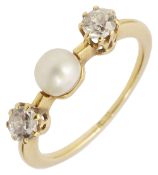 A pearl and two stone diamond ring
