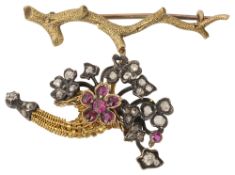 An early 20th c. gem-set and yellow gold spray brooch