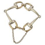 A two coloured 9ct gold snaffle bit bracelet