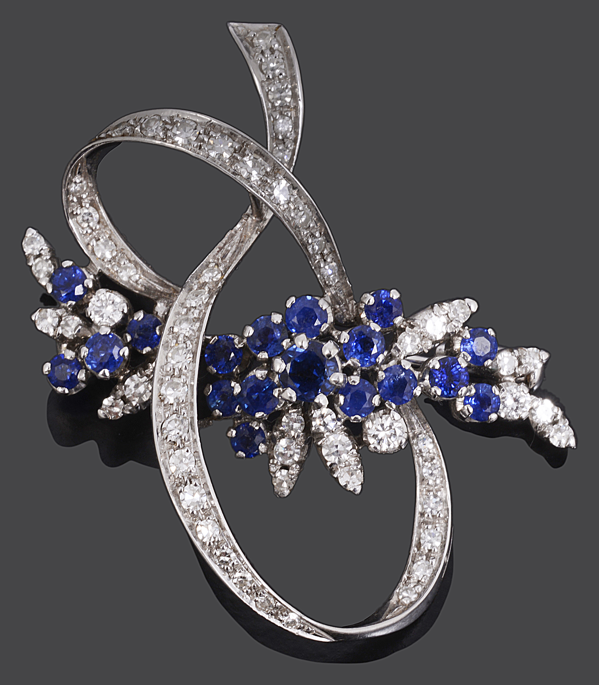 A mid 20th century Continental sapphire and diamond set cocktail brooch