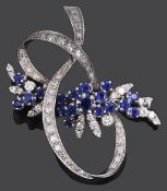 A mid 20th century Continental sapphire and diamond set cocktail brooch