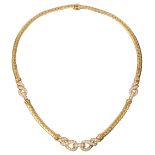 A diamond-set and 18ct yellow gold 'Love Knot' necklace by Cartier