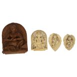 Four Indian carvings of Hindu deities,