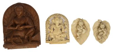 Four Indian carvings of Hindu deities,