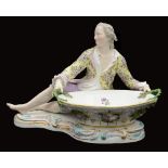 A large late 19th century Meissen style porcelain figural sweetmeat basket