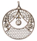 An early 20th century circular diamond-set pendant