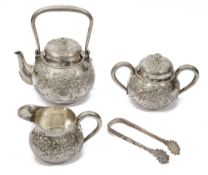 A Japanese Meiji Period silver four piece silver tea service in a fitted case c.1900