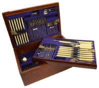 An early 20th c. oak cased twelve setting canteen of Old English pattern EPNS flatware