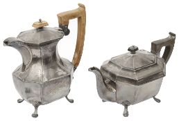 A George V silver hot water jug and a modern silver teapot