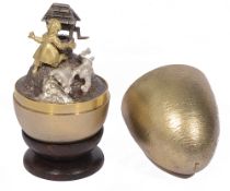 A cased silver-gilt surprise 'Jack and Jill' egg, by Stuart Devlin