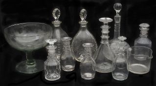 A pair of Whitefriars Spanish cut tri-form decanters and stoppers