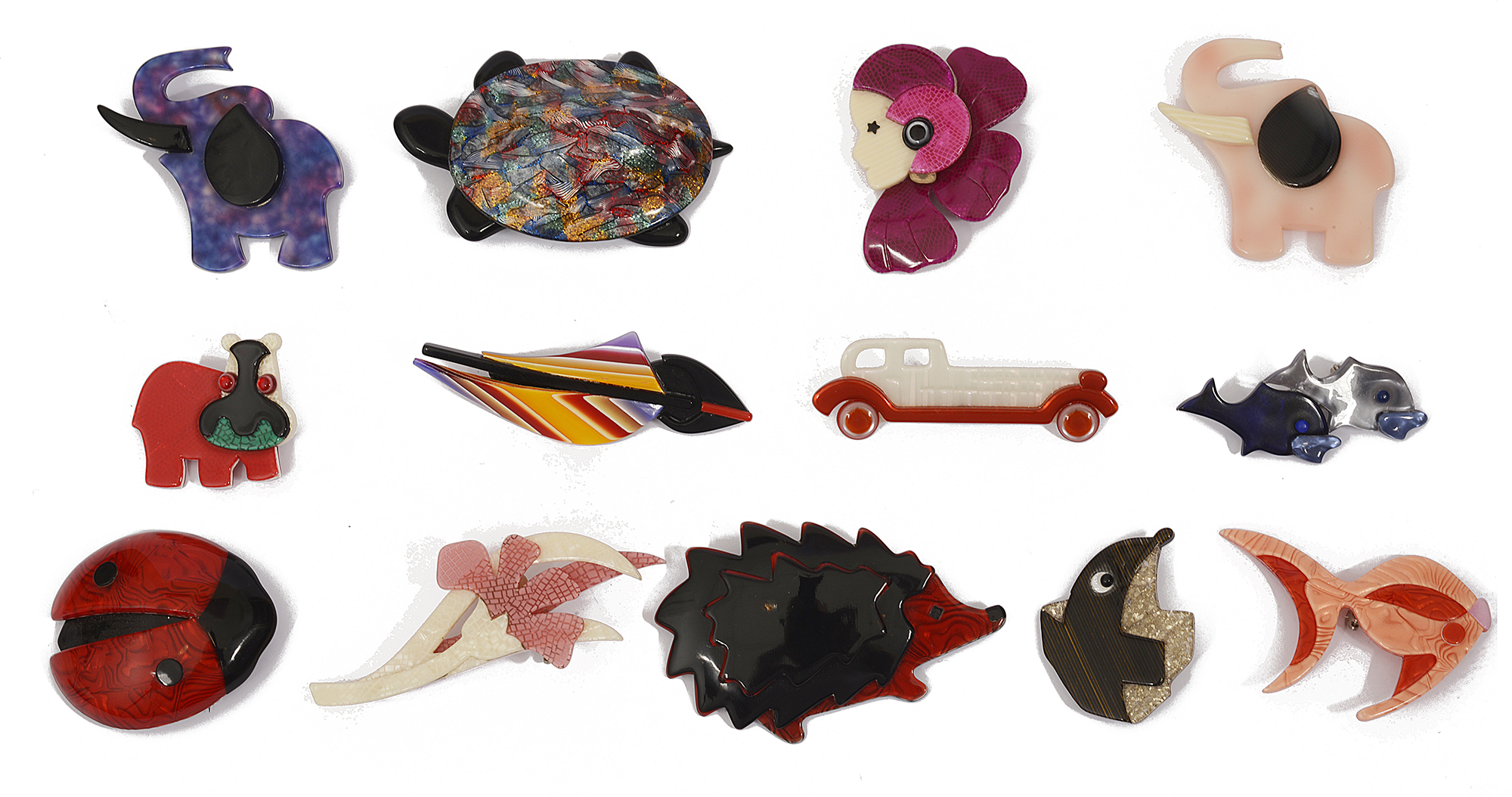 An interesting collection of Lea Stein acrylic brooches