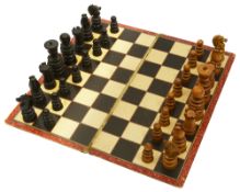 An early 20th century turned ebony and boxwood St George pattern chess set