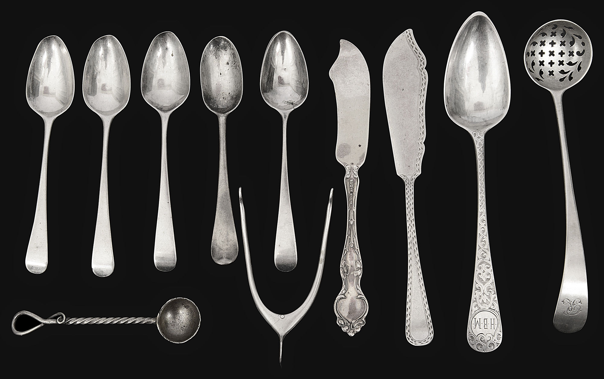A pair of Edwardian Asprey silver wishbone sugar tongs, and other silver