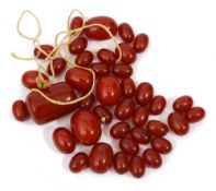 A collection of loose cherry amber beads