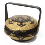 A South East Asian Chinese gold decorated black lacquer wedding basket and cover