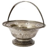 An Edwardian silver swing handled basket