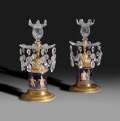 A pair of George III cut glass gilt brass mounted candlesticks, c.1800