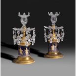 A pair of George III cut glass gilt brass mounted candlesticks, c.1800