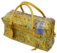 A Louis Vuitton Richard Prince Limited Edition Jaune Defile Pulp Weekender Monogram bag