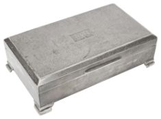A modern silver table cigarette box