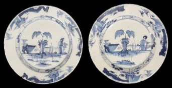 A pair of mid 18th century English Delft plates c.1760