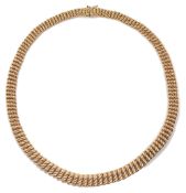 A Continental graduated textured fancy link necklace
