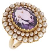 An amethyst and half pearl ring
