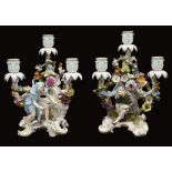 A pair of late 19th century Meissen figural three light candelabra