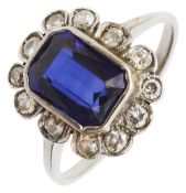 A blue stone and diamond-set cluster ring