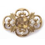 A yellow metal Victorian style citrine and pearl set brooch