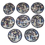 A set of eight Chinese embroidered silk roundels